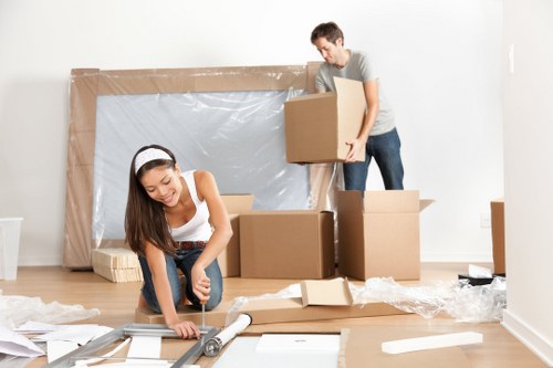 Removal team planning a move in an Earls Court street