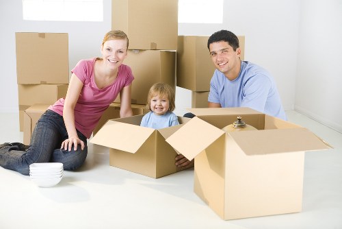 Removal team planning a house move in Earls Court with boxes and furniture