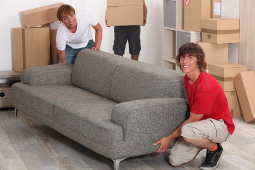 Careful furniture loading for collection in Earls Court with narrow access