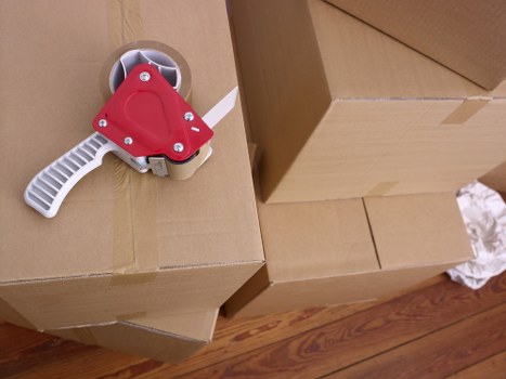 Packing and loading household items for a move in Earls Court