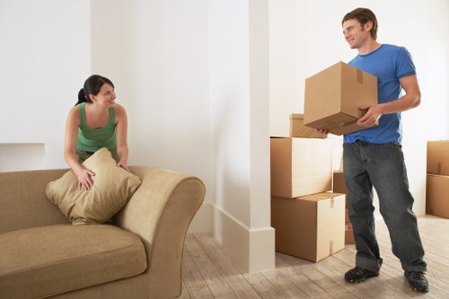 Careful packing of fragile household items for an Earls Court move